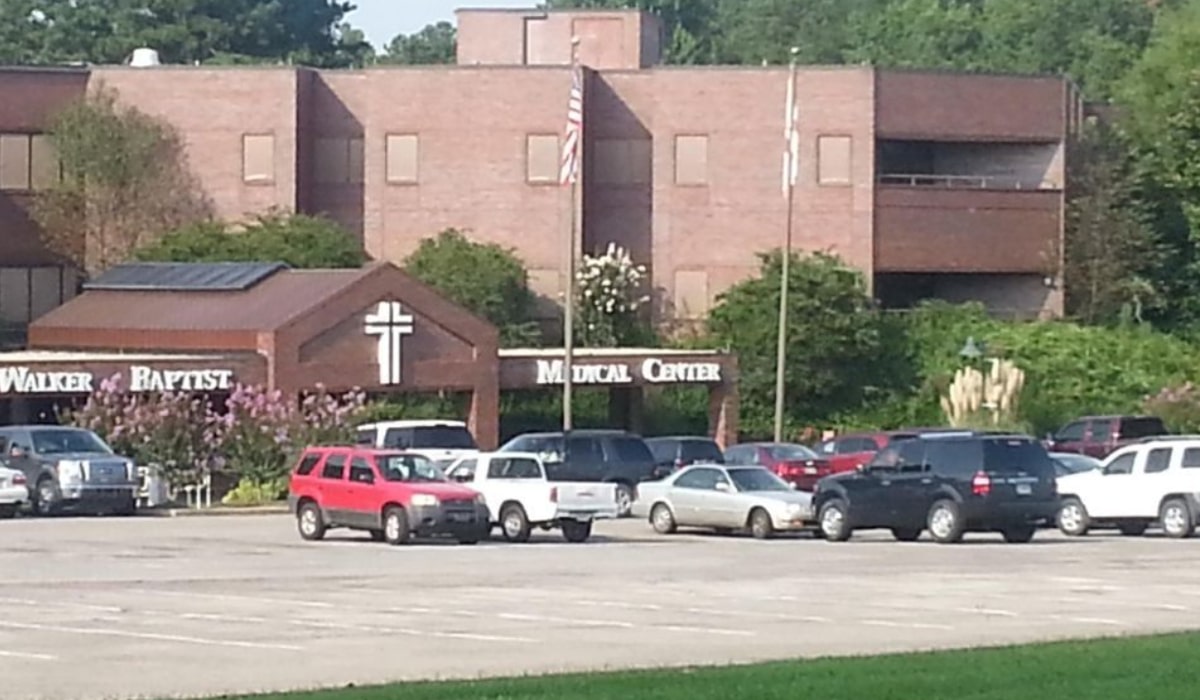 a car parked on the side of a building